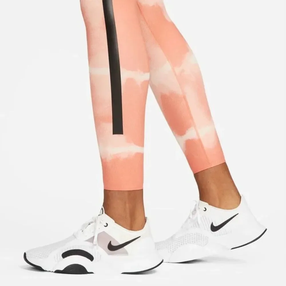 Nike Leggings LARGE One Luxe Women's Mid-Rise Printed Training Leggings Orange